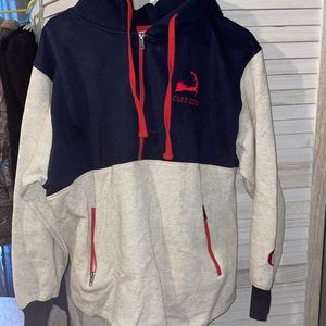 Women’s sweater size medium.